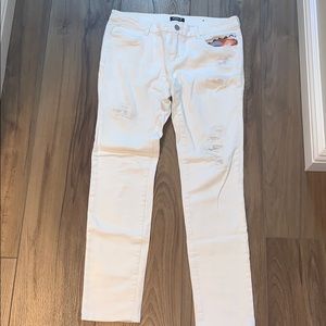 White jeans with Aztec pocket design